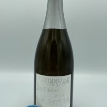 spumante vino Champagne Francia Vino spumante Champagne Francia metodo classico arte Philippe Stark raffinato vintage perlage fine ottenuto con uva chardonnay e pino nero perfetto con le carni bianche e il caviale